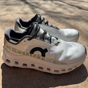 On Cloudmonster Athletic Sneakers in White/Black